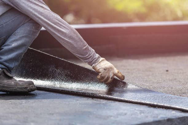 Professional Basement Waterproofing technician working in Denver, NC